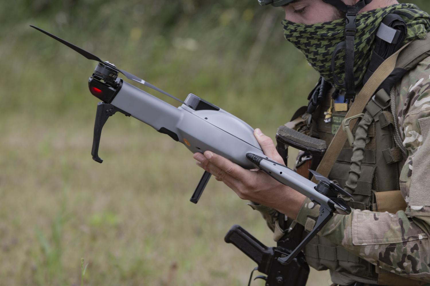 Ukrainian military member launches a drone during a military exercise at a training area in 2022 in Cherkasy Oblast, Ukraine. (Getty/Yan Dobronosov)