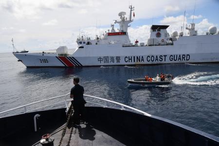 As the world looks elsewhere, China stirs trouble in the South China Sea